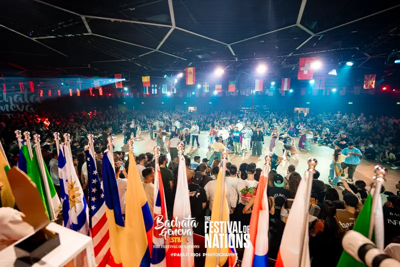 The floor of the Finals seen behind a row of national flags